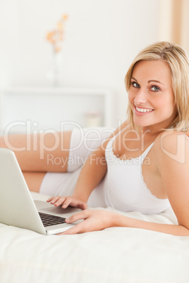 Portrait of a woman with a laptop