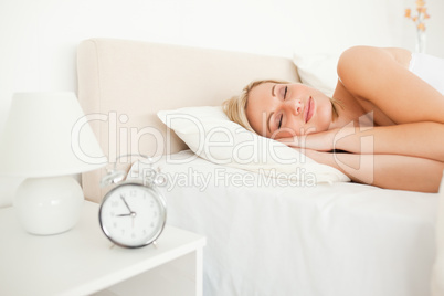 Quiet woman sleeping in her bedroom
