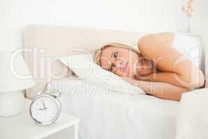 Unhappy woman waking up