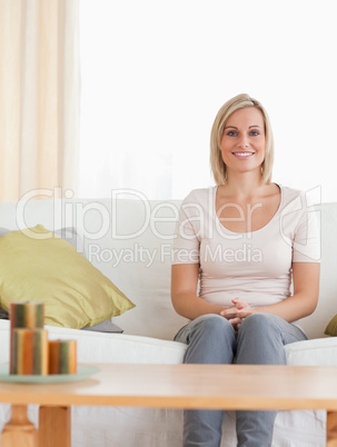 Woman sitting on a sofa