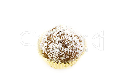 cake topped with coconut flakes isolated on white