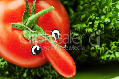 tomato with a nose and green