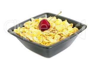 bowl of cornflakes and cherries isolated on white