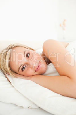 Portrait of a serene woman opening her eyes