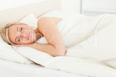 Serene blonde woman sleeping