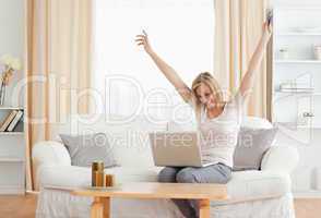 Cheerful woman shopping online