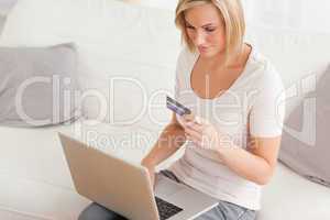 Close up of a woman shopping online