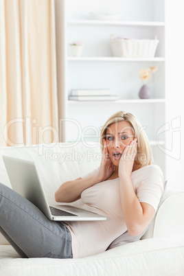 Portrait of woman having trouble her laptop