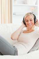 Portrait of a cute woman enjoying some music