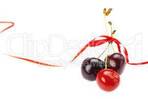 cherry with ribbon isolated on white