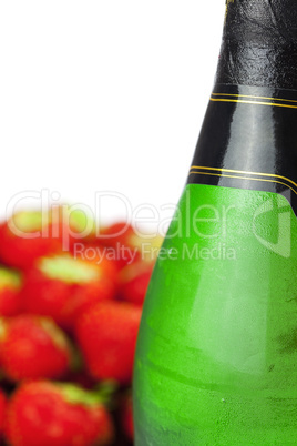 Champagne glass and strawberries isolated on white
