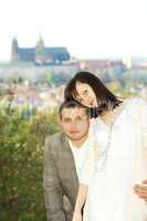 just married on the background of Prague