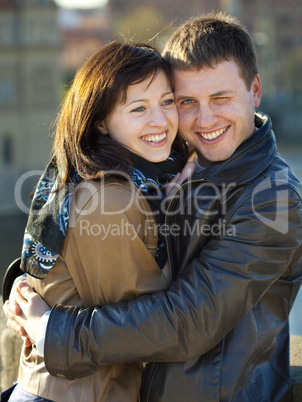 young couple on the Charles Bridge on the skyline