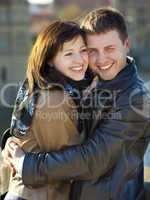 young couple on the Charles Bridge on the skyline