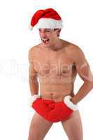 Sexy muscular man screams wearing a Santa Claus hat
