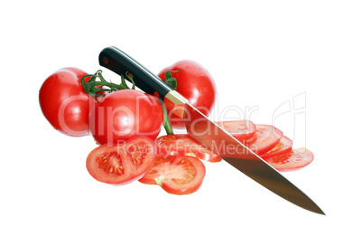 Sliced Tomatoes And Knife