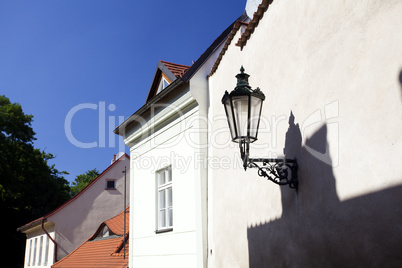 The lantern on the wall against the sky