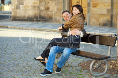 love couple sitting on the bench