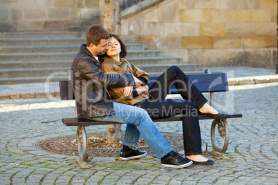 love couple sitting on the bench love couple sitting on the bench