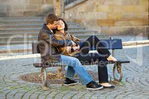 love couple sitting on the bench