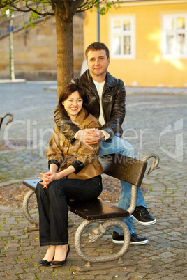 love couple sitting on a bench