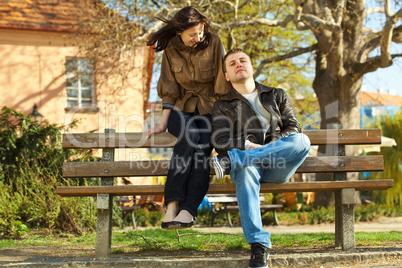 love couple sitting on a bench