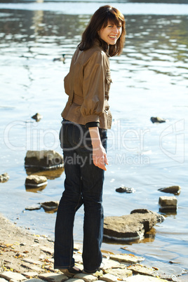 beautiful young woman at the river