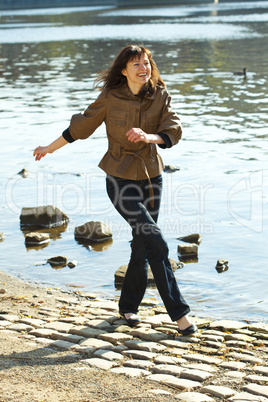 beautiful young woman at the river