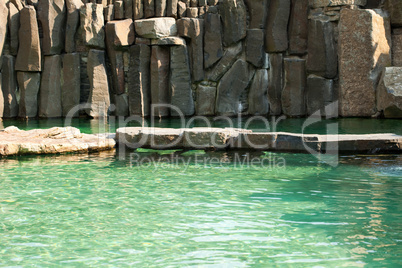 pool with blue water and rocks