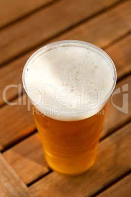 beer standing on a wooden table