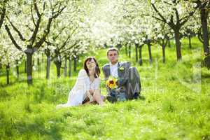 just married in a flowering garden