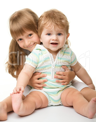 Two children are having fun