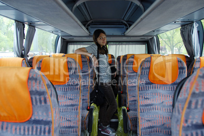 Teenage girl tourist in bus