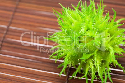 hazelnuts on a bamboo mat