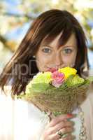 portrait of a young beautiful bride with a bouquet