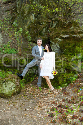 just  married   standing at wall