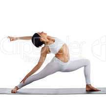 woman in white doing yoga - warrior asana isolated