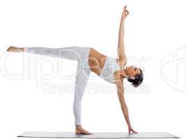 woman stand in yoga asana - half moon pose