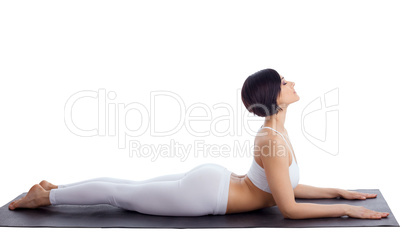 Pretty girl  in white sphinx yoga pose isolated