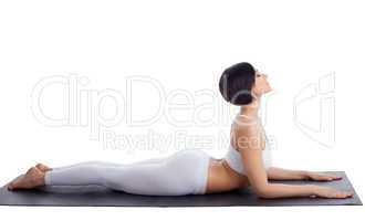 Pretty girl  in white sphinx yoga pose isolated