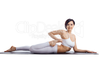 beauty woman in yoga bend  on rubber mat