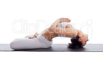 woman exercise lotos yoga asana on rubber mat