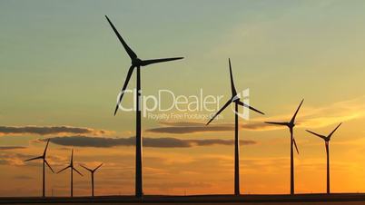 Wind turbines and sunset