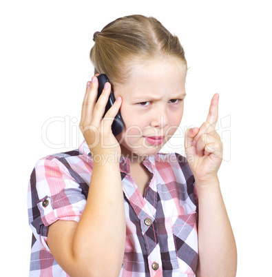 The beautiful girl with astonishment speaks on the phone