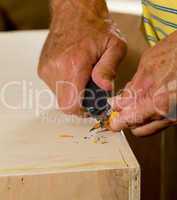 Sharpen a pencil with blade