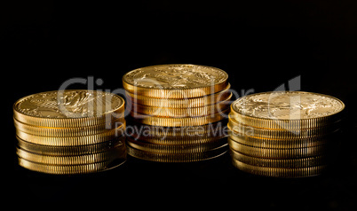 Macro image of gold eagle coin on stack