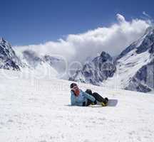 Snowboarder on ski slope