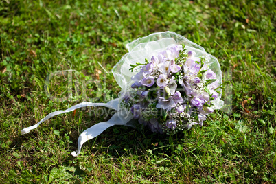bridal bouquet lying on the grass