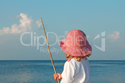 A little girl on the seashore