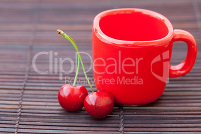 cherry cup on bamboo mat